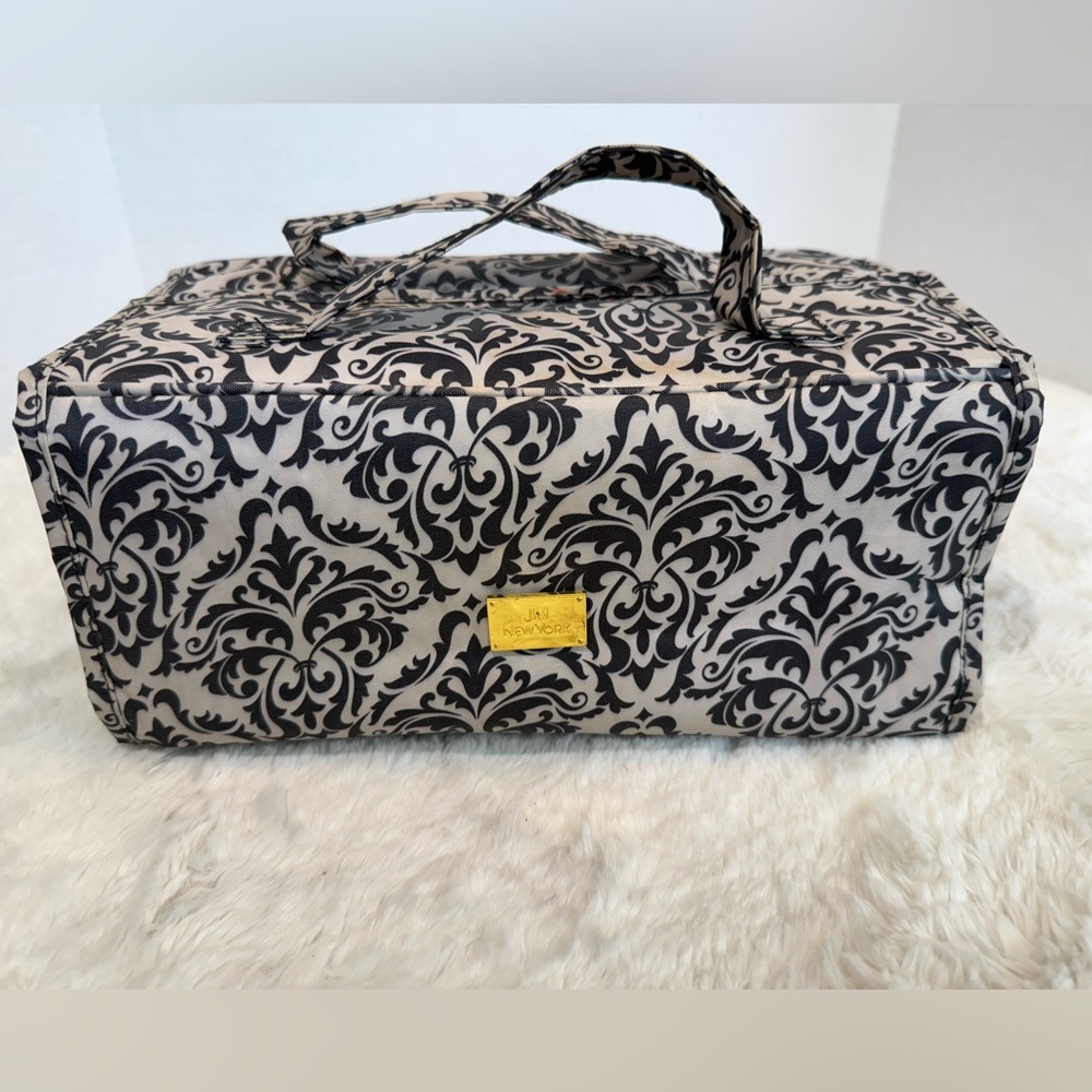 JM New York small roll up cosmetic travel bag in a black & white print